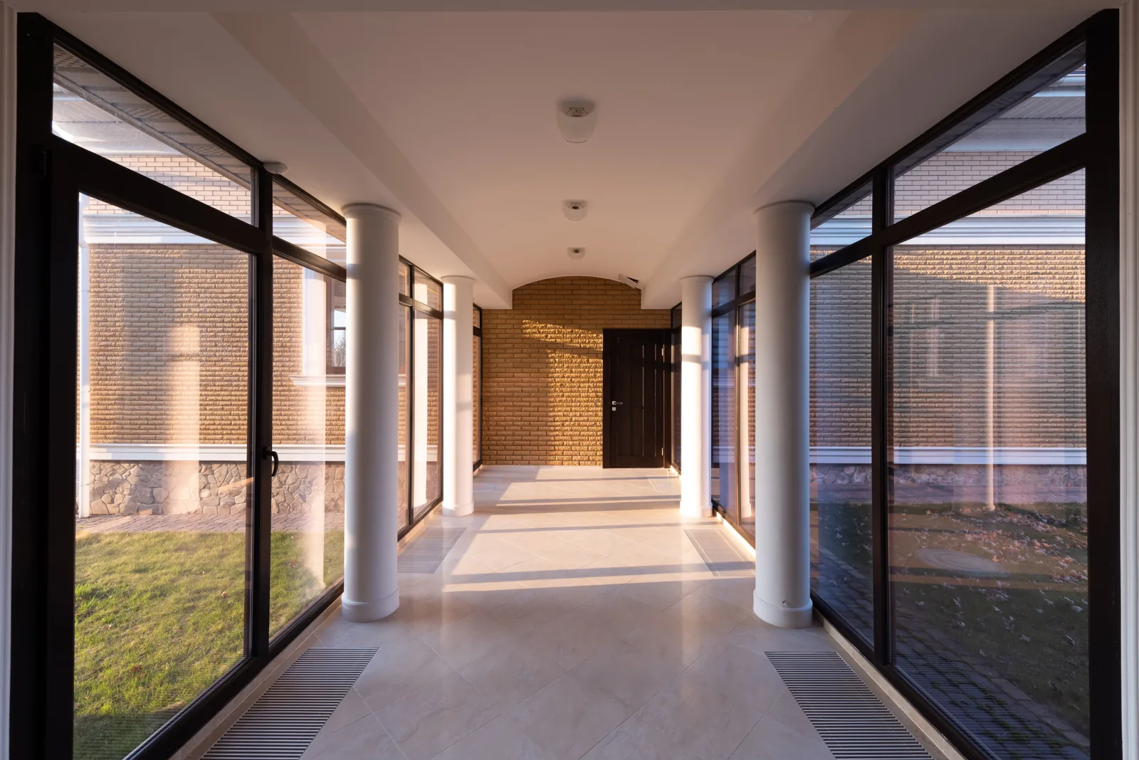 Screened Florida patio with sliding glass doors in the evening